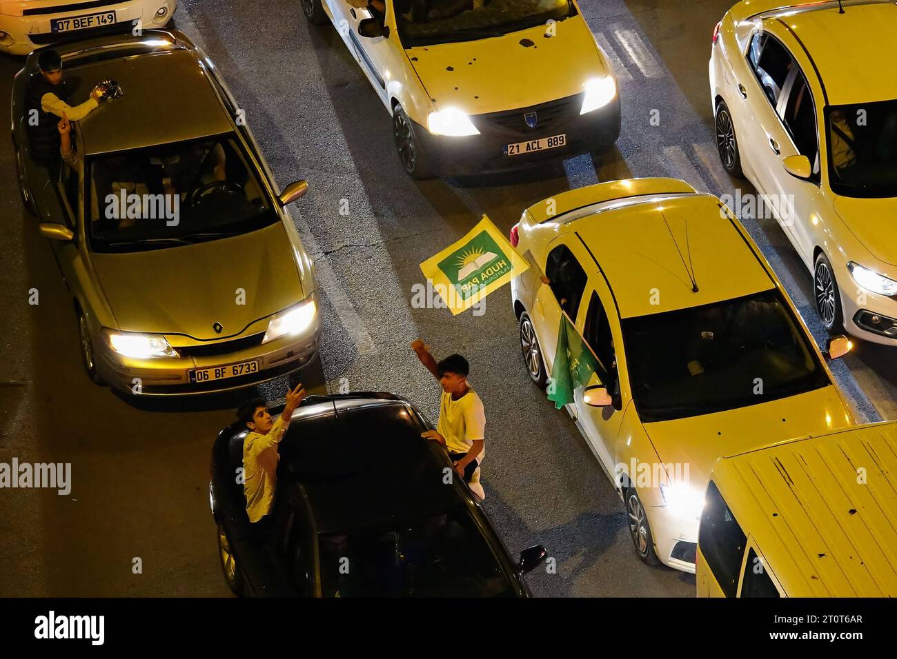 Protester seen carrying a flag of the Kurdish extreme Islamic party ...