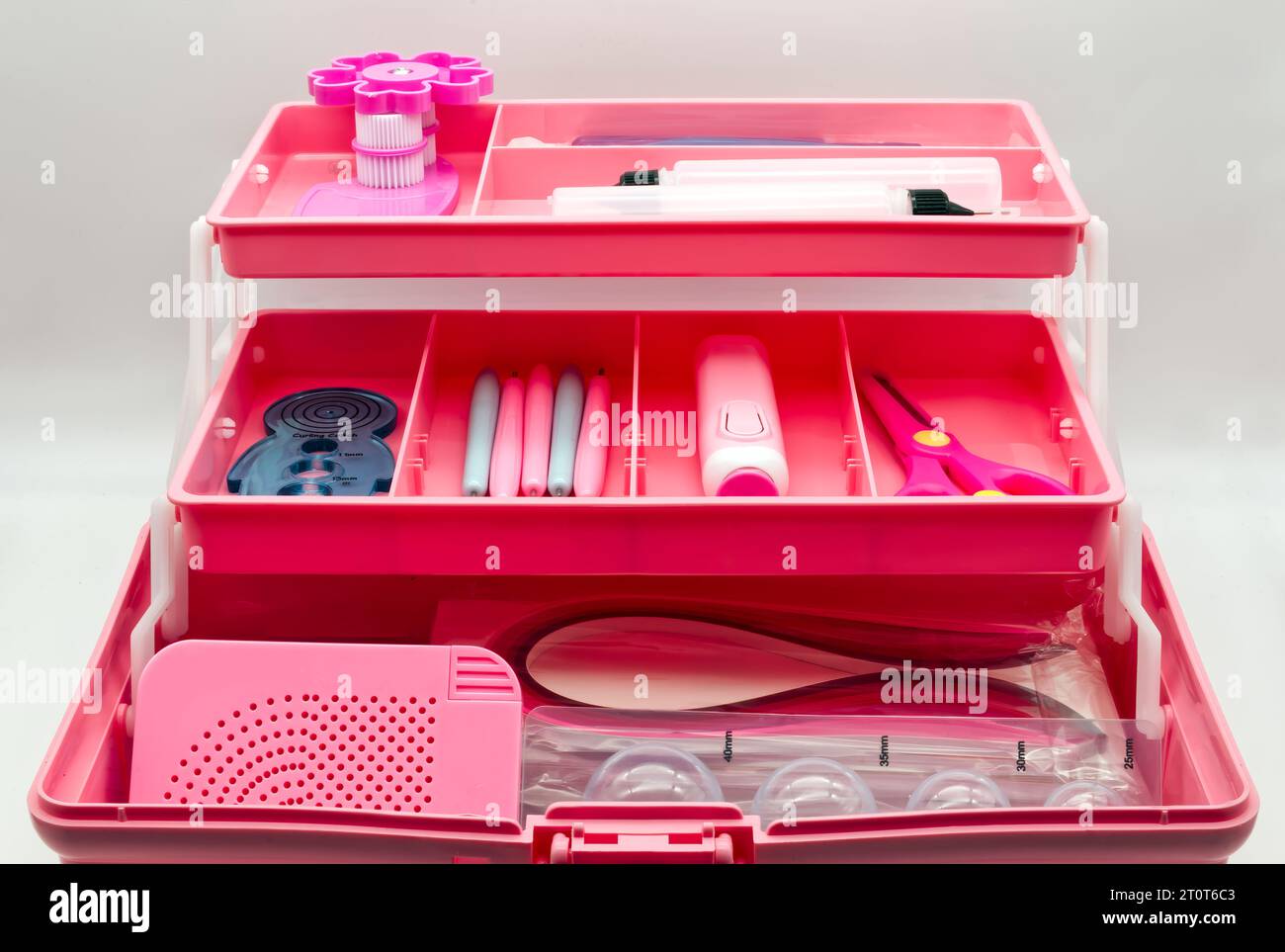 Quilling tool box isolated on white background. Pink box quilling kit