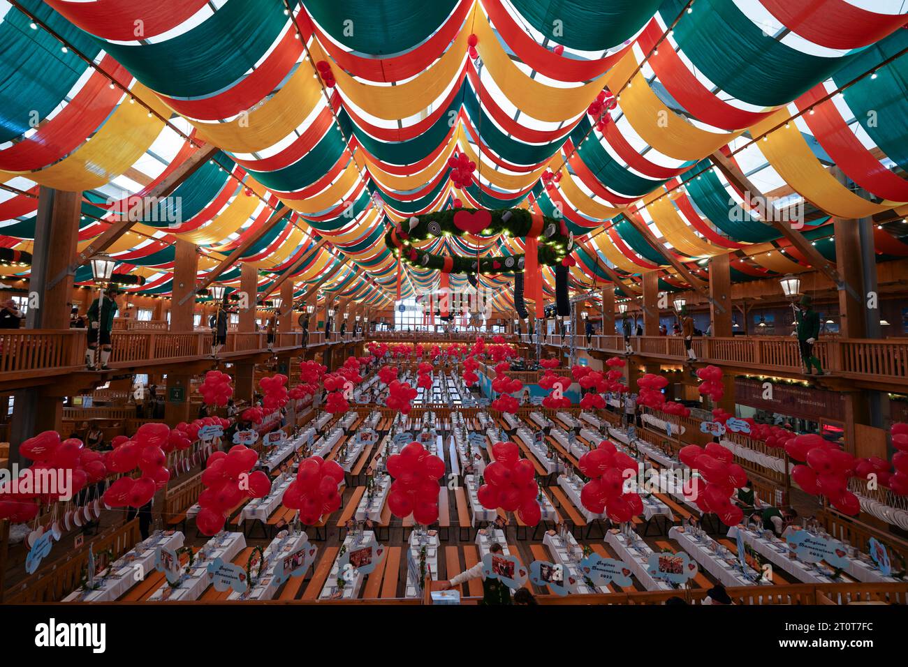 Munich, Germany, EU -September 18, 2023. Oktoberfest Schützen Festzelt beer tent, staff preparing for Lady's Day at the annual German beer festival. Stock Photo