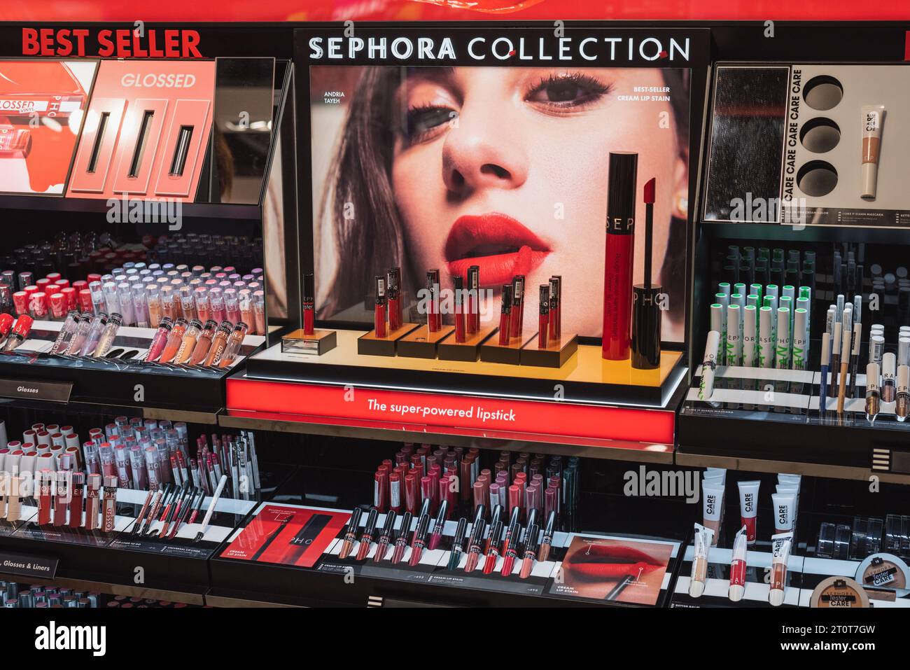 Bangkok, Thailand - September 16, 2023: a stand with a collection of lipsticks, lip liners, lip balms, and other cosmetics in a Sephora shop. Stock Photo