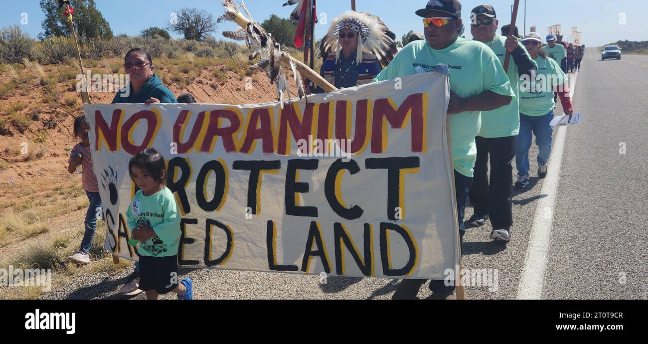 Utah, USA. 7th Oct, 2023. People take part in a peace rally held near the White Mesa uranium mill to draw attention to the mill's environmental and health impacts, in Utah, the United States, Oct. 7, 2023. The White Mesa mill has been processing uranium ore next to the Ute Mountain Ute Reservation in southeast Utah for more than four decades.The mill, the only operating conventional uranium mill in the United States, has sparked increasing concerns for its impacts on the environment and public health. Credit: Bradley Angel/Xinhua/Alamy Live News Stock Photo