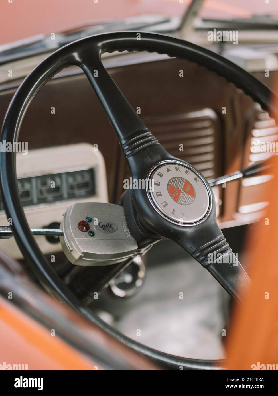 Dashboard detail, showing the logo on the steering wheel, of a 1950s Studebaker Hauler pickup truck Stock Photo