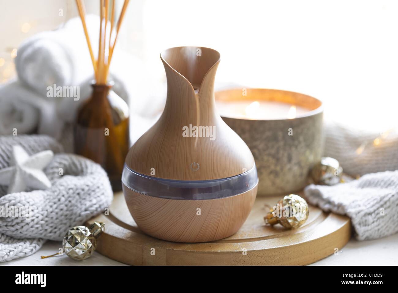 Still life with an aroma diffuser for moisturizing the air and winter ...