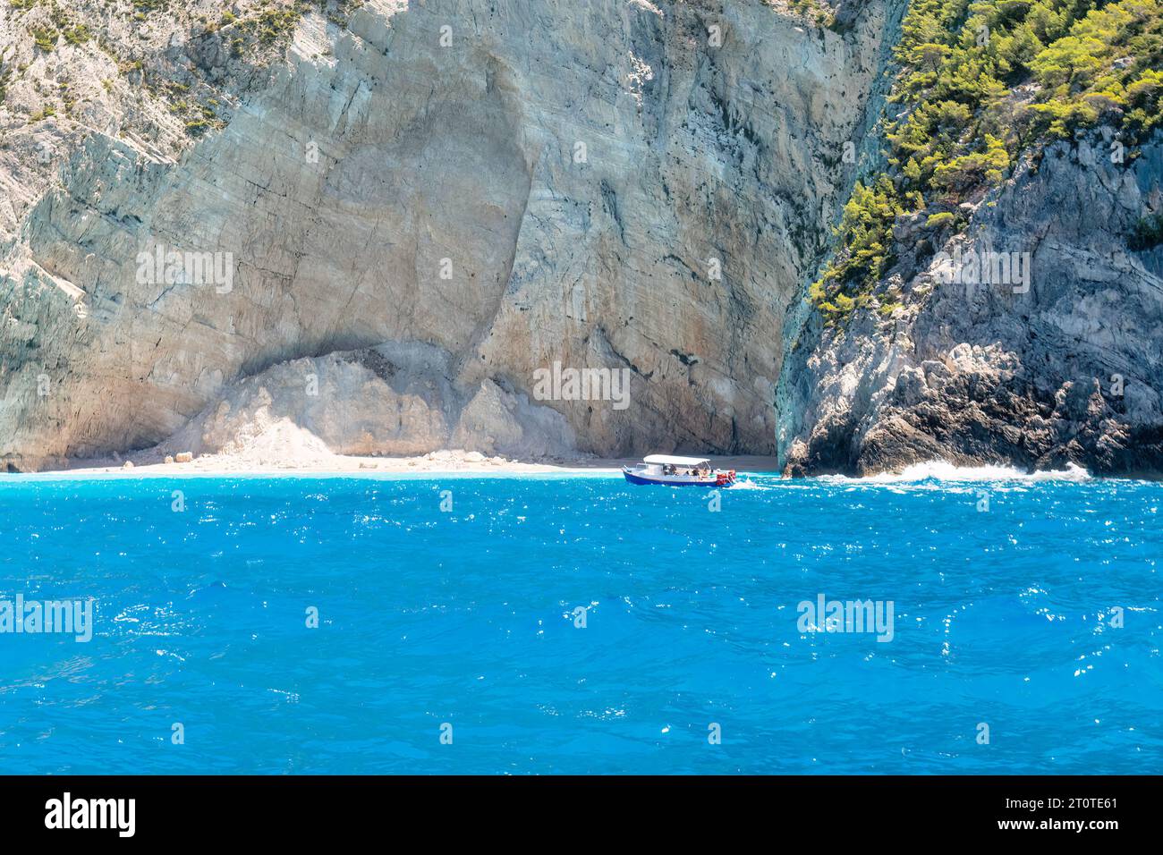 Visiting the blue caves in Zakynthos island in Greece. Stock Photo