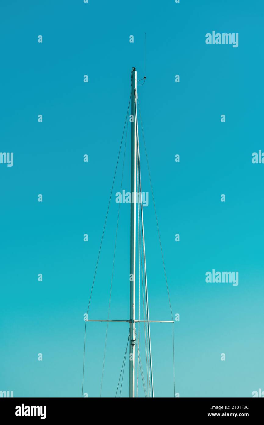 Standing rigging of a boat mast against blue sky Stock Photo Alamy