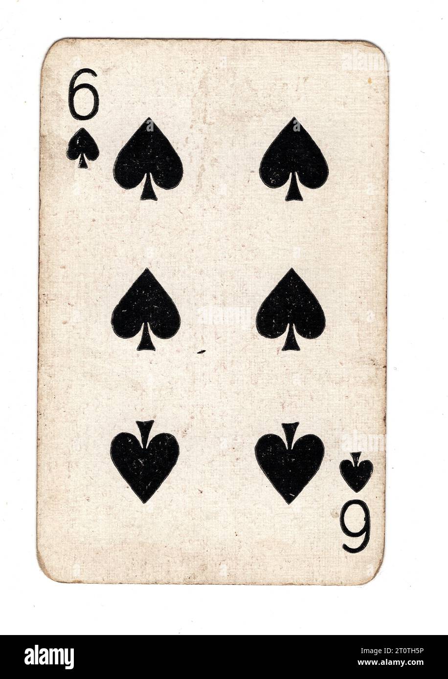 A vintage six of spades playing card isolated on a white background. Stock Photo