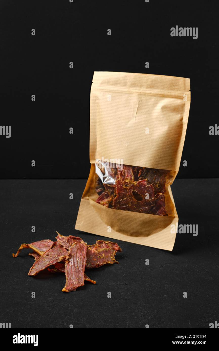 Dehydrated lamb jerky in paper package Stock Photo Alamy