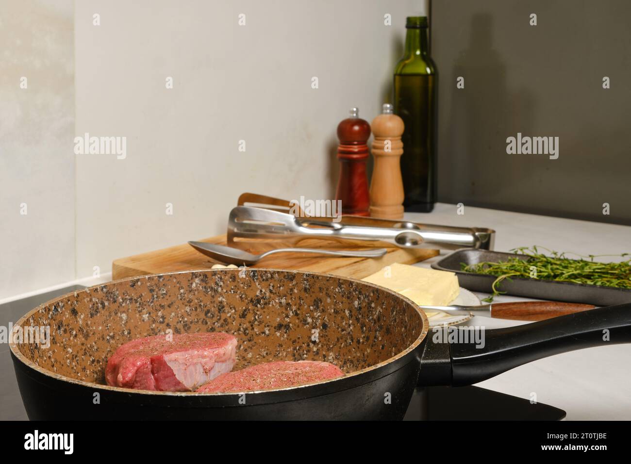 Frying top sirloin beef steak in the kitchen Stock Photo