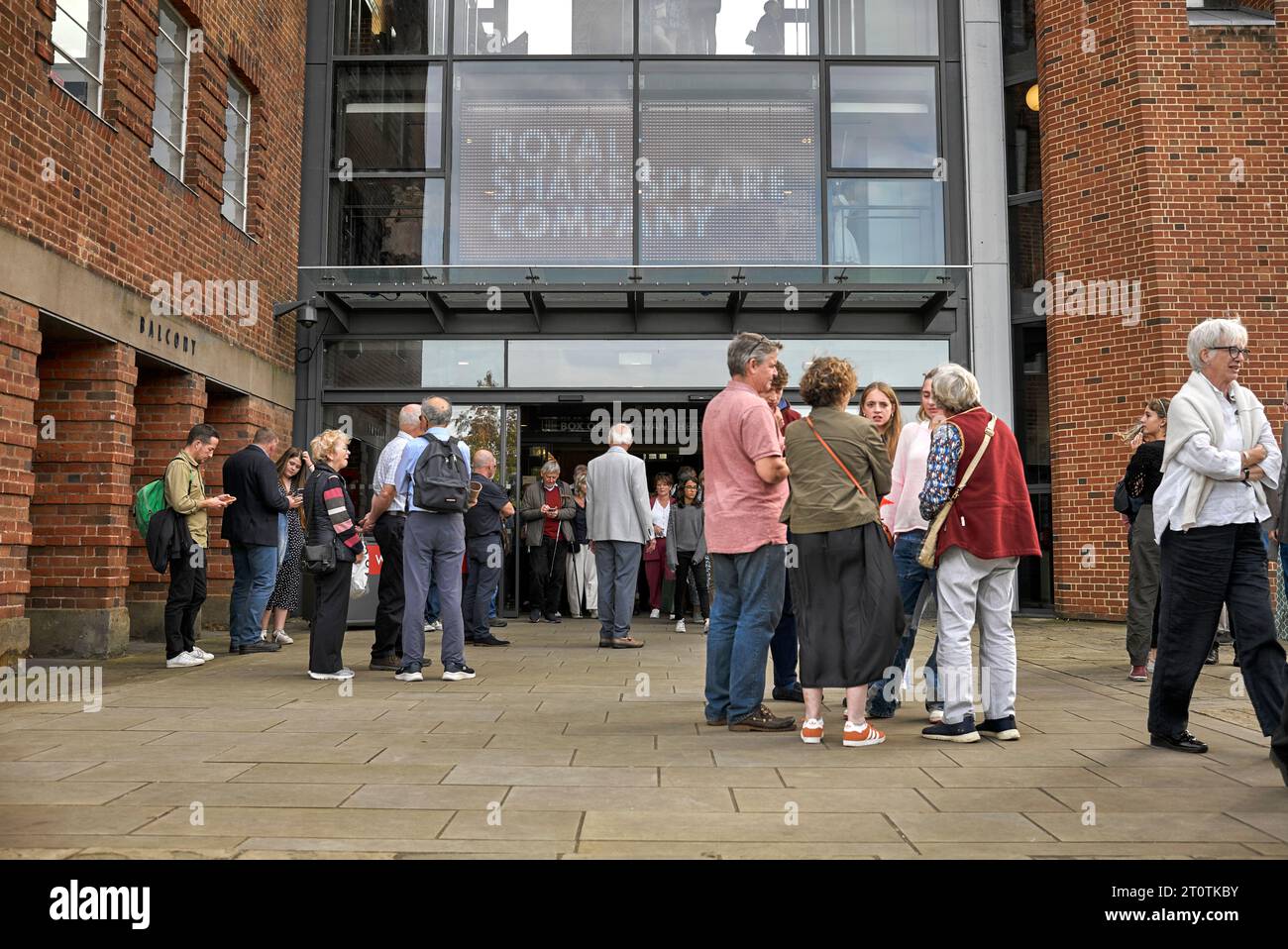 RSC theatre goers at the entrance of the Royal Shakespeare Company theatre Stratford upon Avon Warwickshire England UK Stock Photo