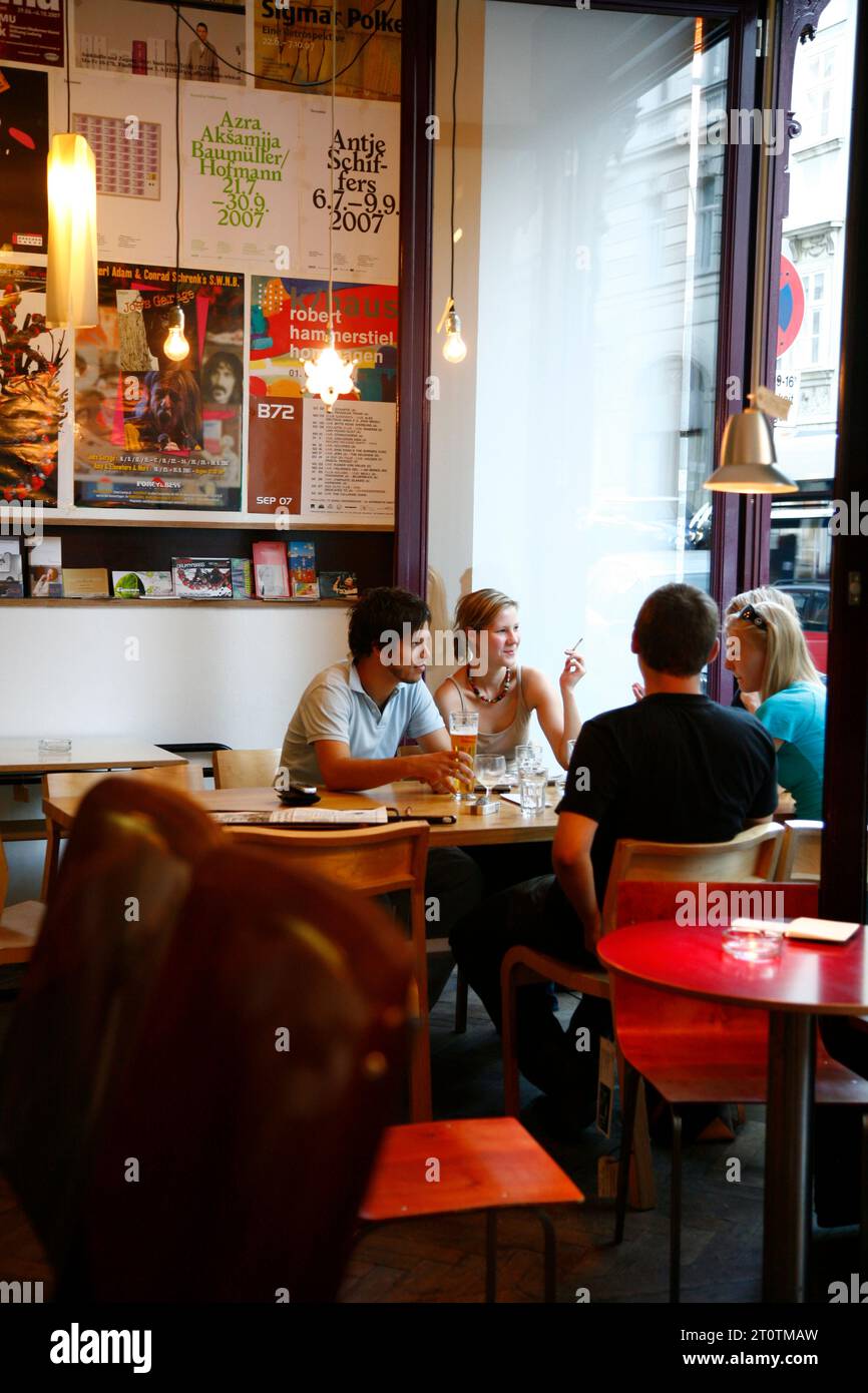 People sitting at the trendy Das Mobel cafe, Vienna, Austria. Stock Photo