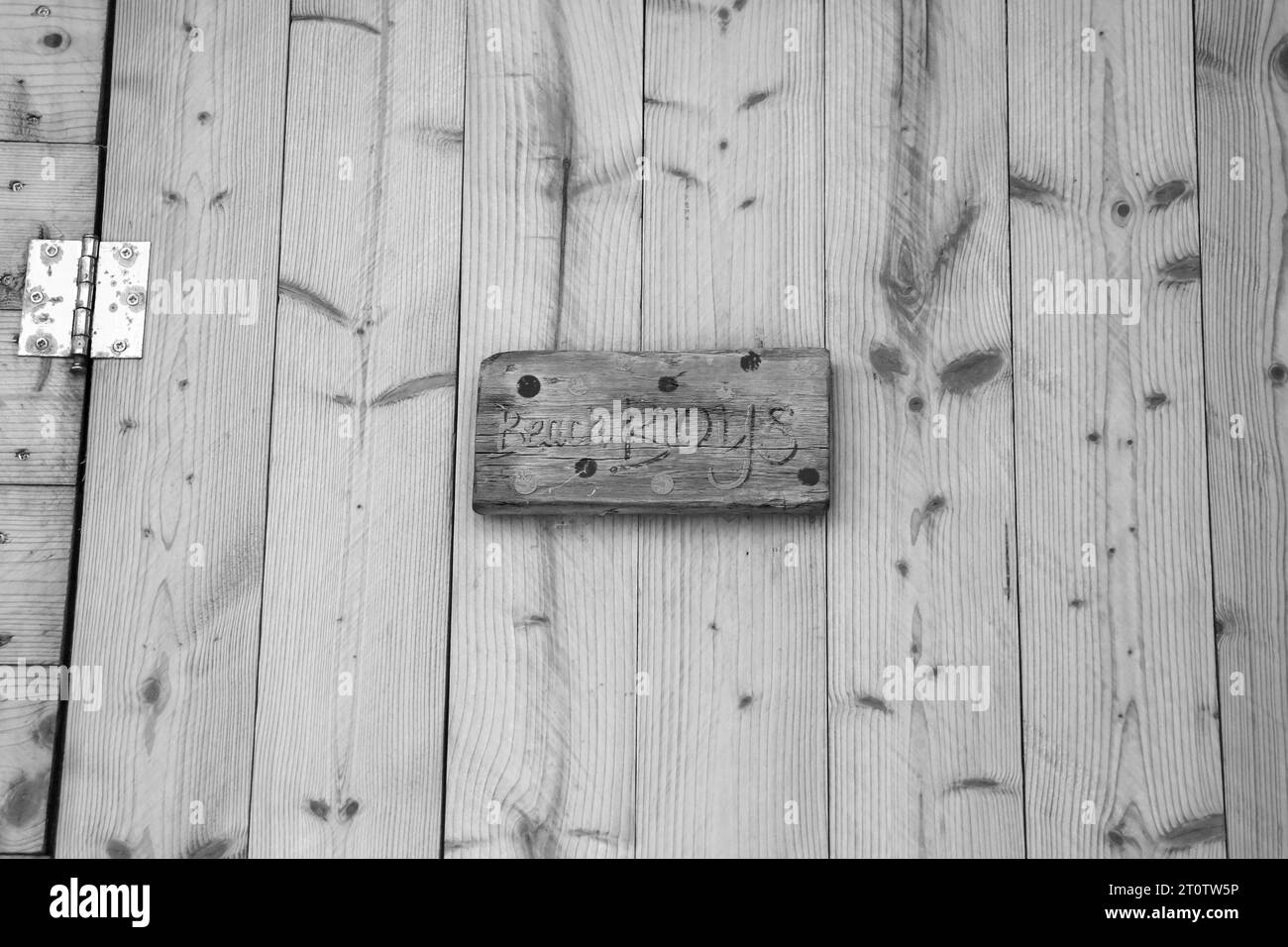 Black and white sign writing Beach Boys indicating a changing room or