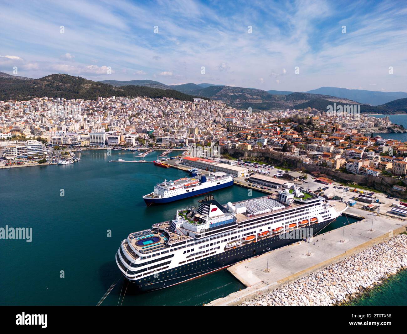 Aerial view cruise ship in port of Kavala. Kavala is a picturesque city located in northeastern Greece, known for its stunning aerial views. Visitors Stock Photo