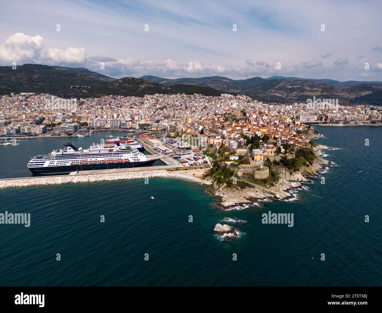 Aerial view cruise ship in port of Kavala. Kavala is a picturesque city located in northeastern Greece, known for its stunning aerial views. Visitors Stock Photo