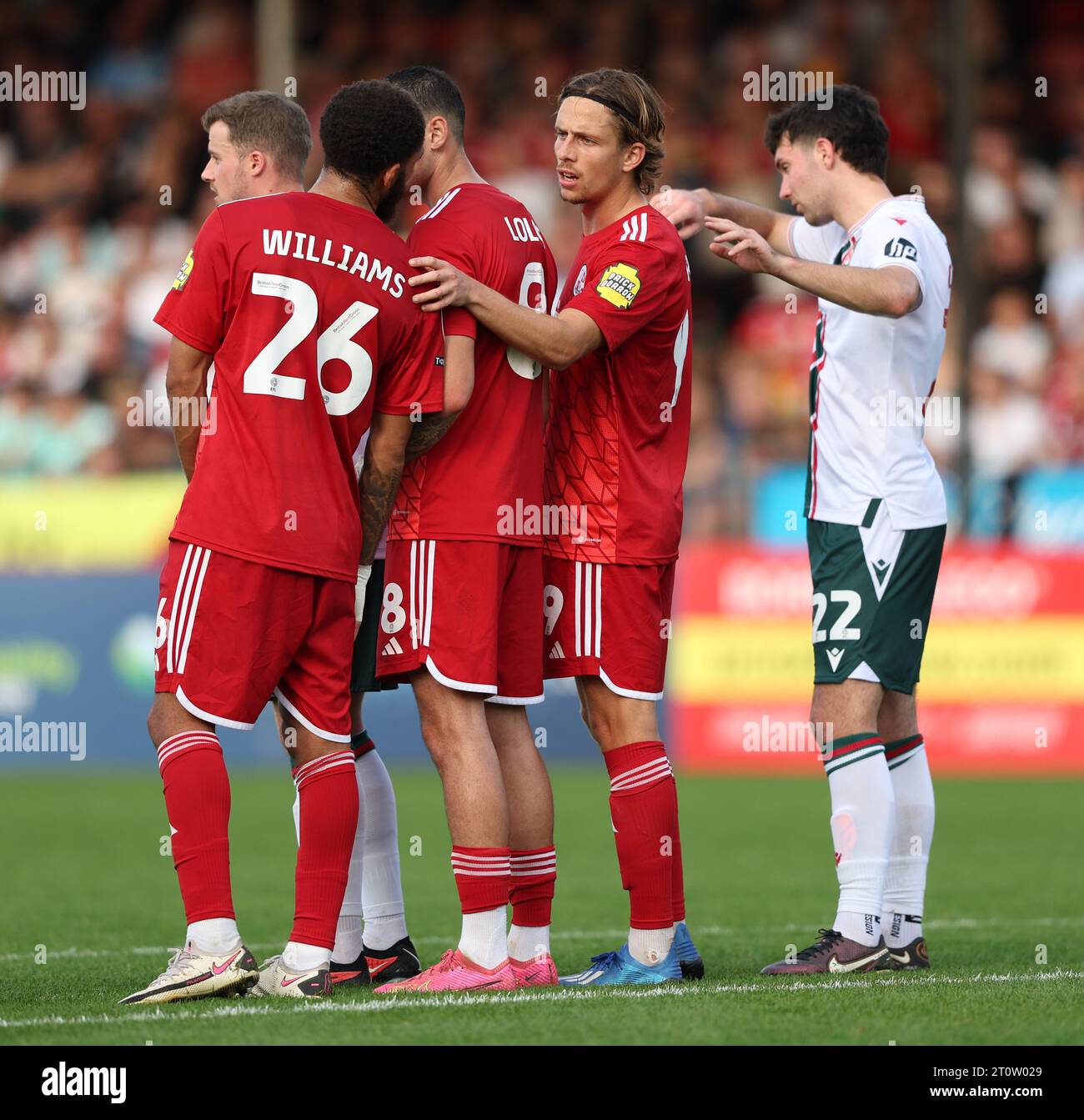 Crawley Town's Danilo Orsi talks with Crawley Town's Jay Williams in 