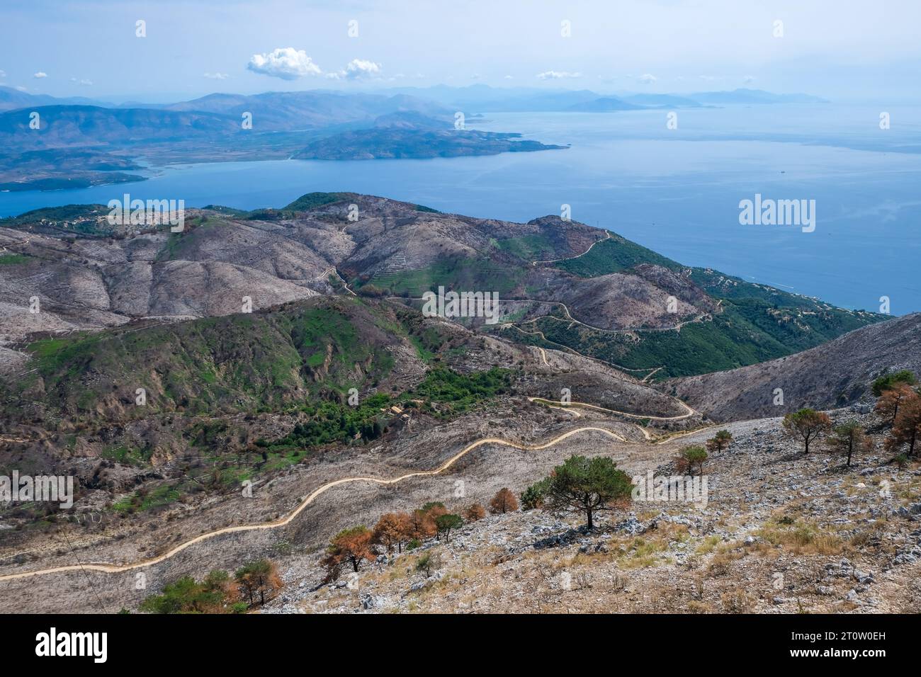 Pantokrator, Corfu, Greece - Mount Pantokrator with view over barren mountain landscape and the Ionian Sea towards mainland Albania. The Pantokrator i Stock Photo