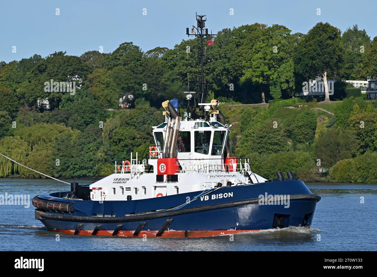Tugboat VB BISON operates at the port of Hamburg Stock Photo