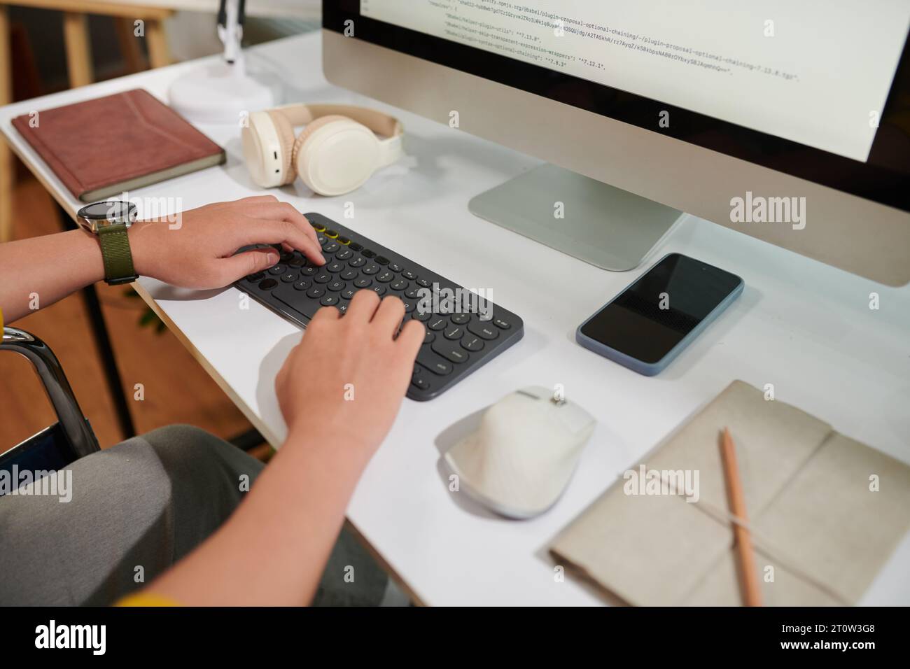 Cropped image of programmer reviewing code on computer screen Stock Photo