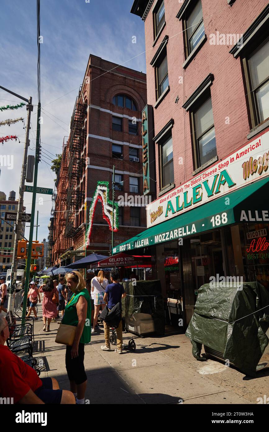 NEW YORK, USA - NOVEMBER 26, 2022: famous and oldest alleva cheese shop and pedestrians in manhattan Stock Photo