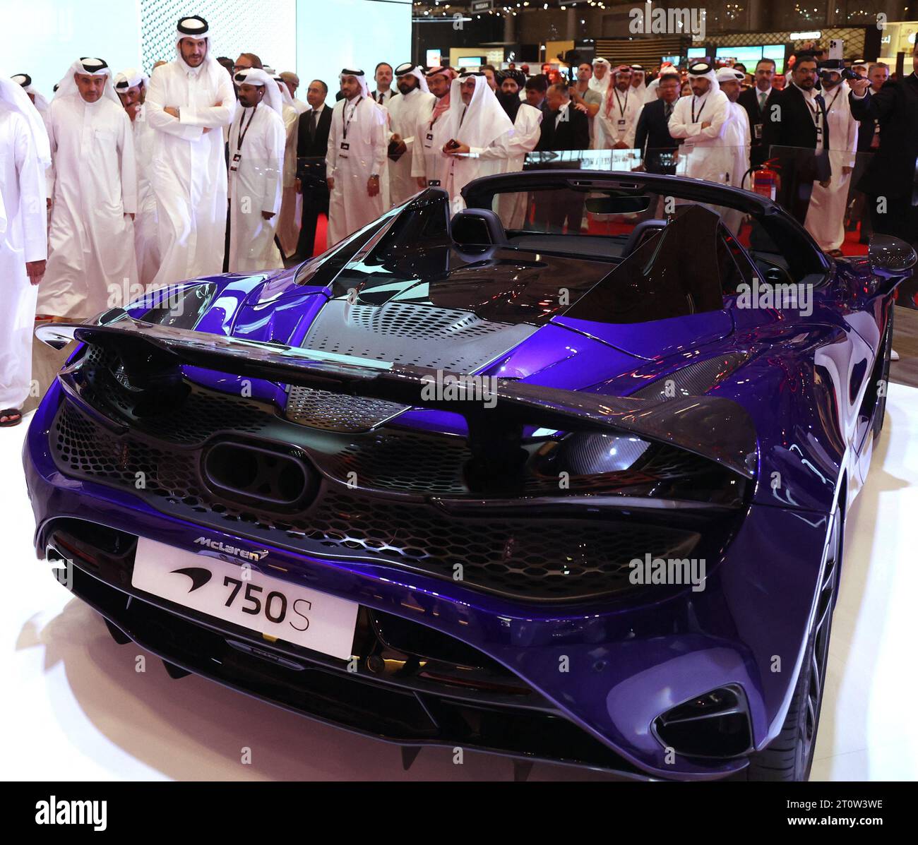 Doha, Qatar. 05th Oct, 2023. Qatari nationals look at the McLaren 750