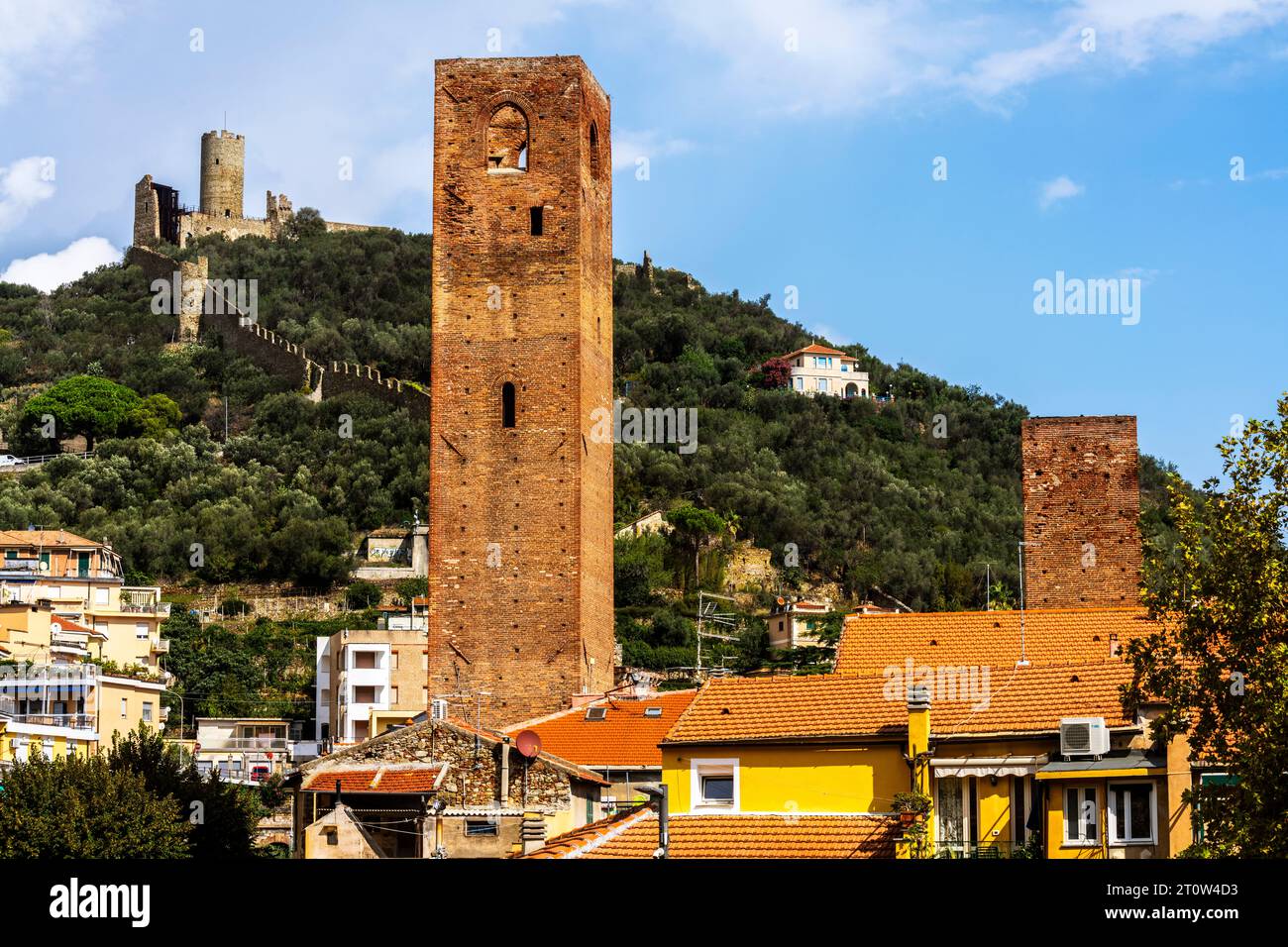The Mount Ursino Castle of Noli rises on the top of a hill overlooking Noli. Italy.The castle was able to control both the sea and the Ligurian coast. Stock Photo
