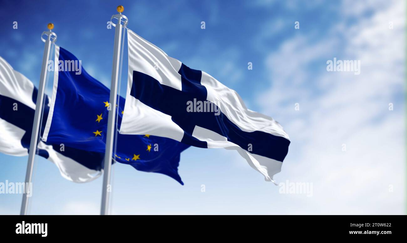National flags of Finland waving in the wind with the European Union ...