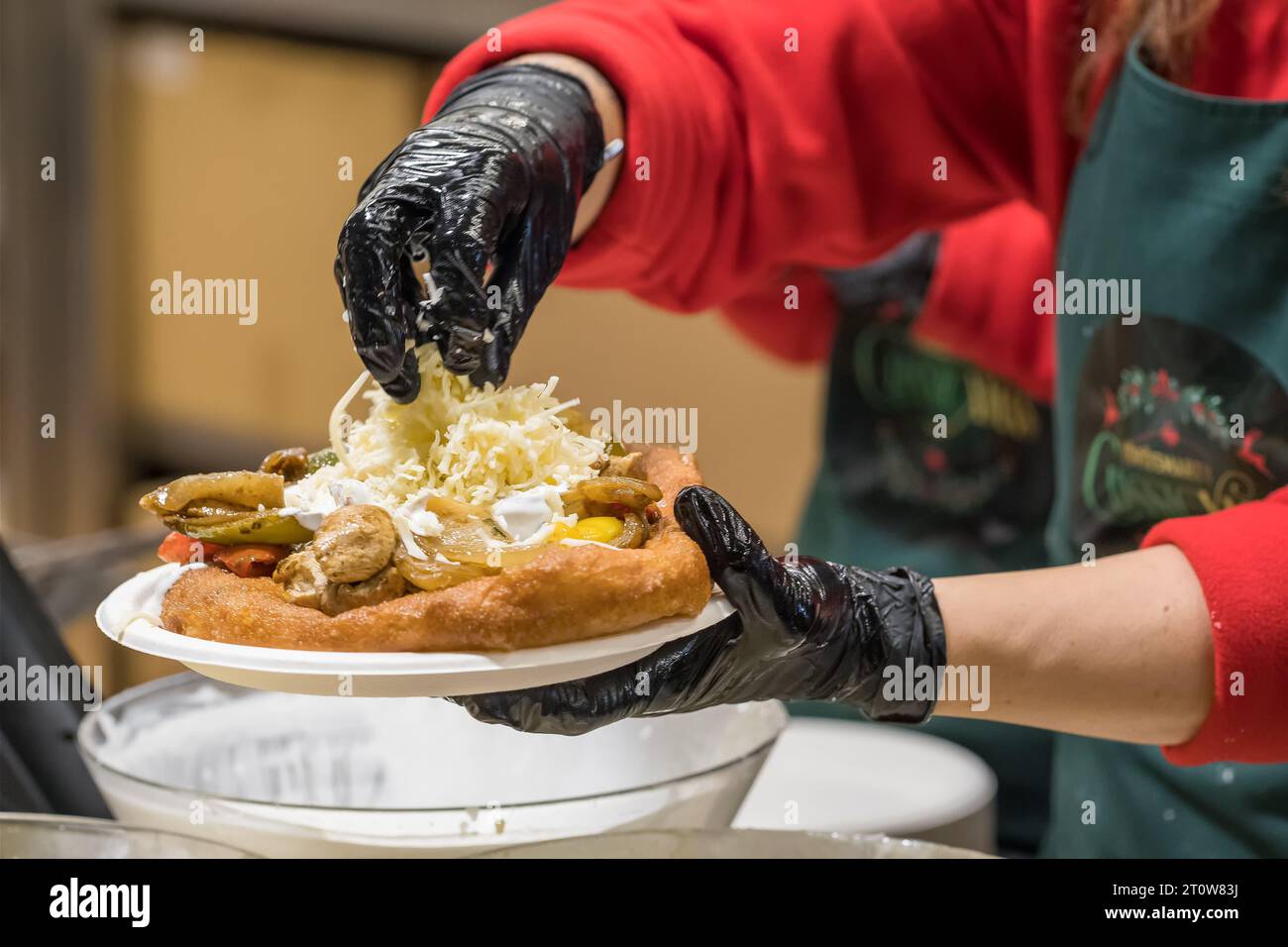 Traditional Hungarian street food Langos at fair Stock Photo