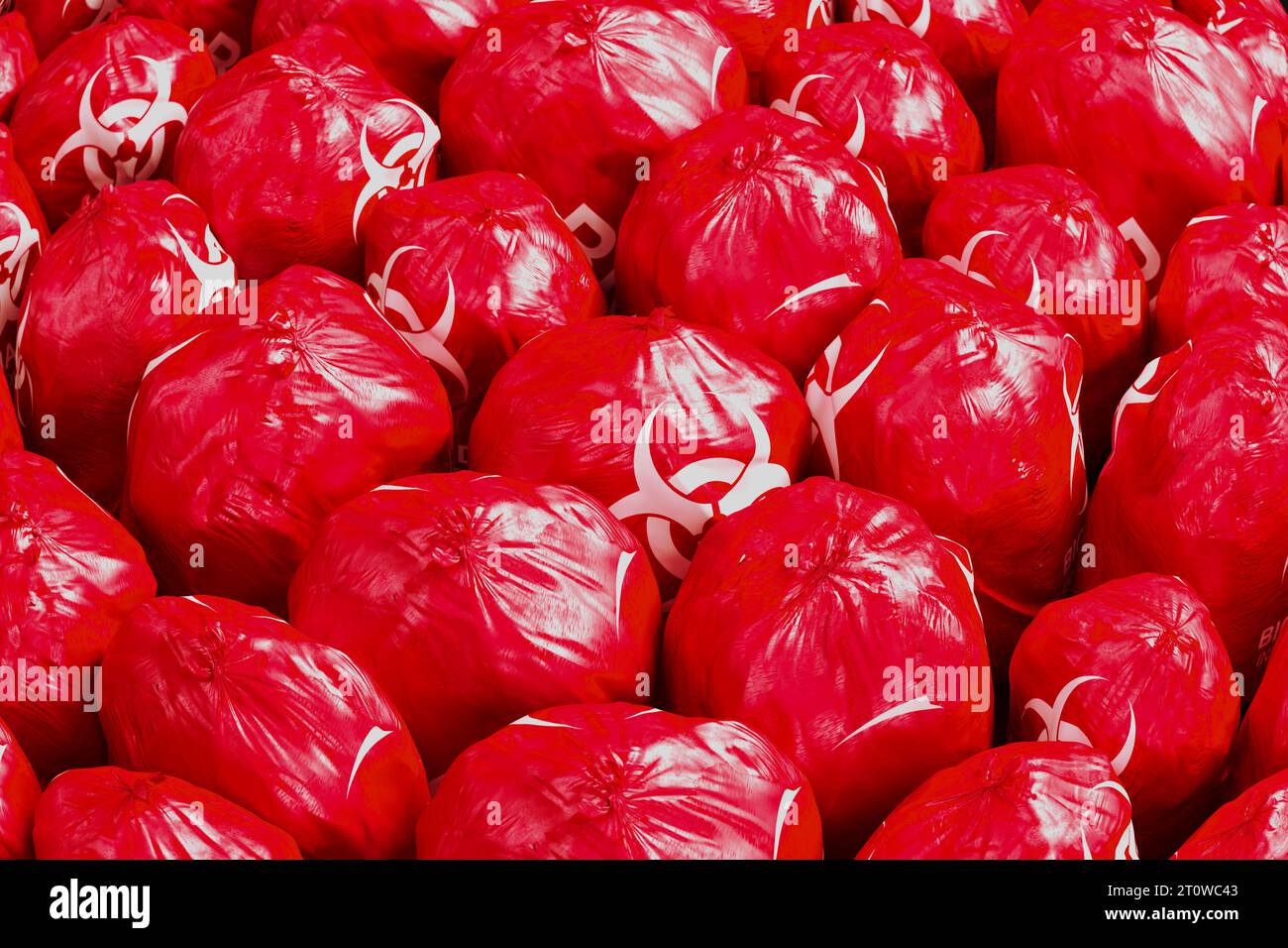 Picture of the countless red biohazard trash bags full of dangerous waste. Medical, biomedical of infectious solid or non-sharp waste disposal. Waste Stock Photo