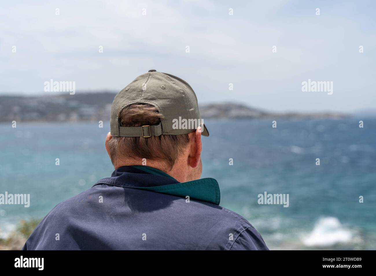 Mykonos, Greece. 10th May, 2023. old man looking out to sea on Mykonos in Greece *** alter Mann schaut hinaus auf das Meer auf Mykonos in Griechenland Credit: Imago/Alamy Live News Stock Photo