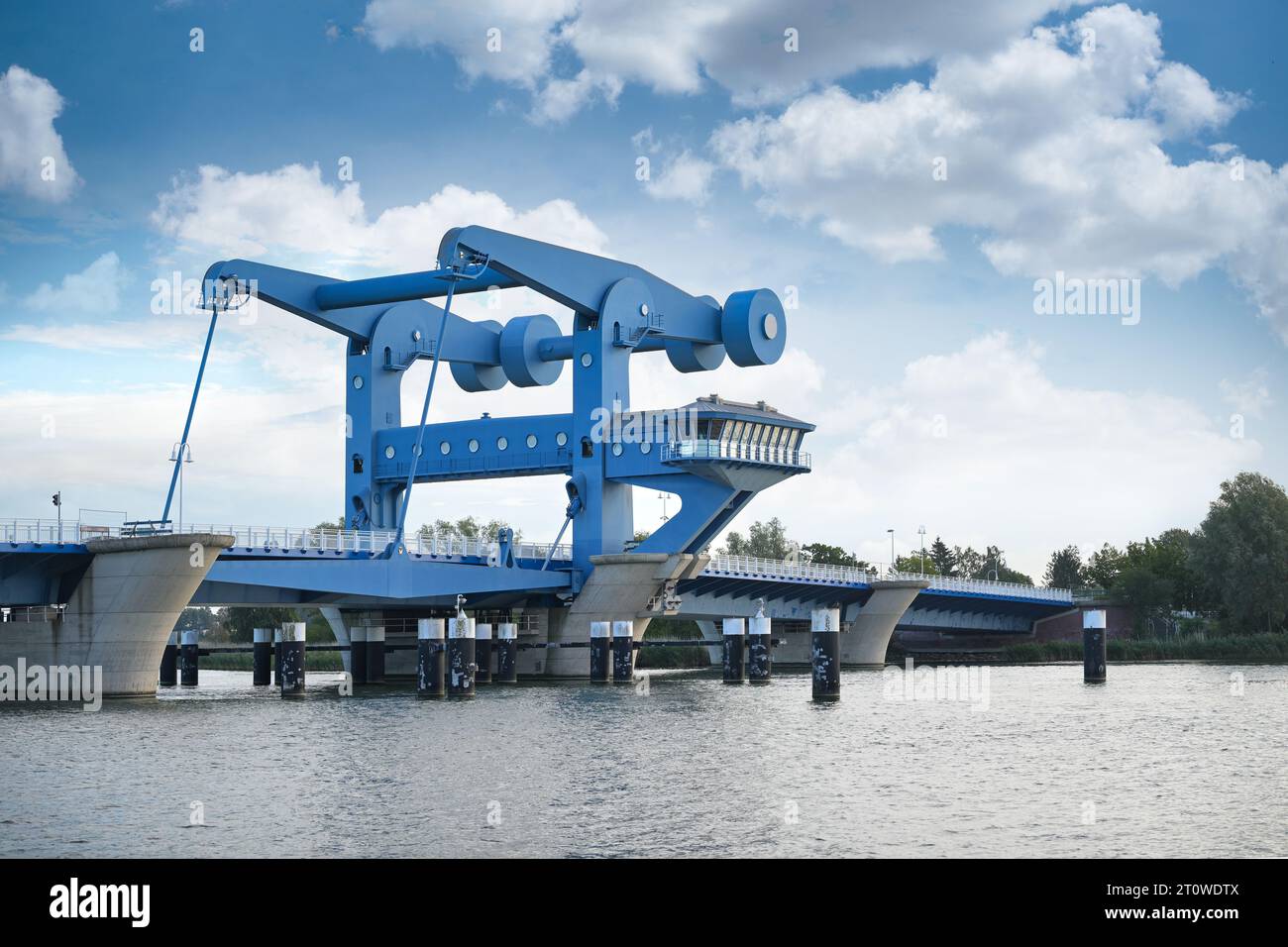 Bascule bridge in Wolgast called Blaues Wunder (blue miracle), combined road and railroad bridge over the Peene river connecting the mainland in in Me Stock Photo
