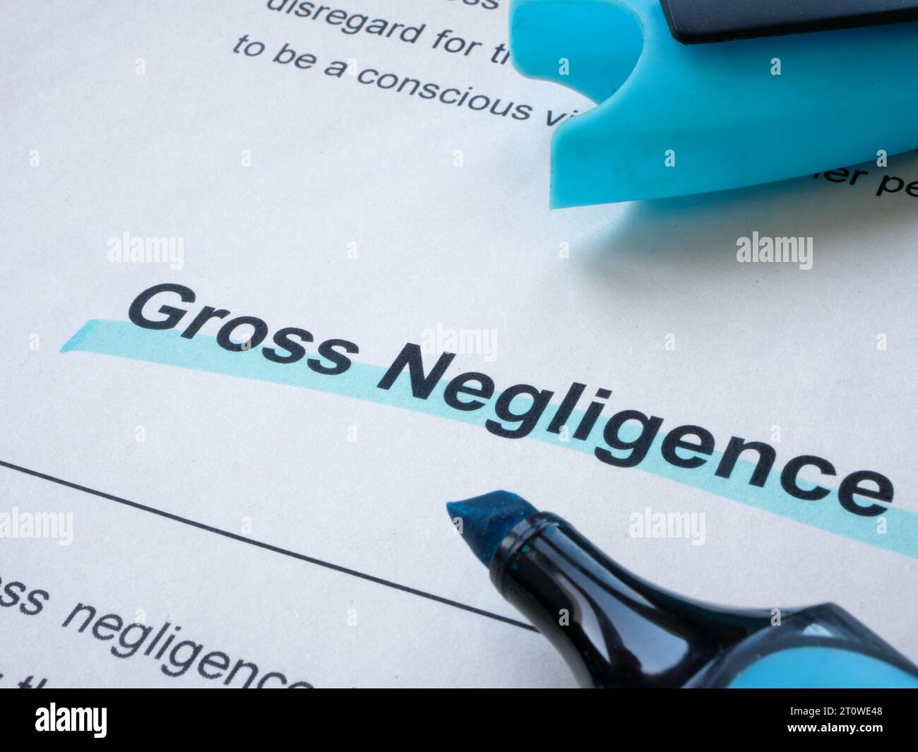 Inscription Gross negligence is underlined with a marker. Stock Photo