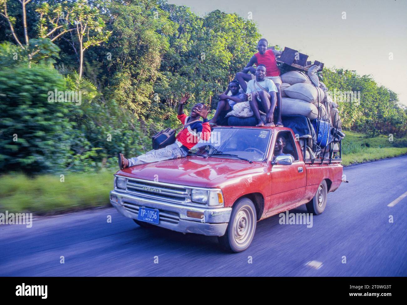Liberia, people go back to their village by taxi bus with purchases from the market in Monrovia Stock Photo