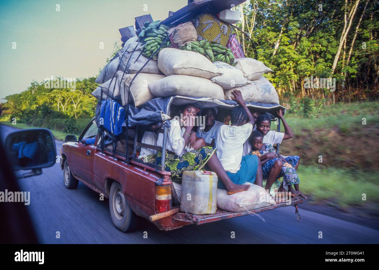 Liberia, people go back to their village by taxi bus with purchases from the market in Monrovia Stock Photo