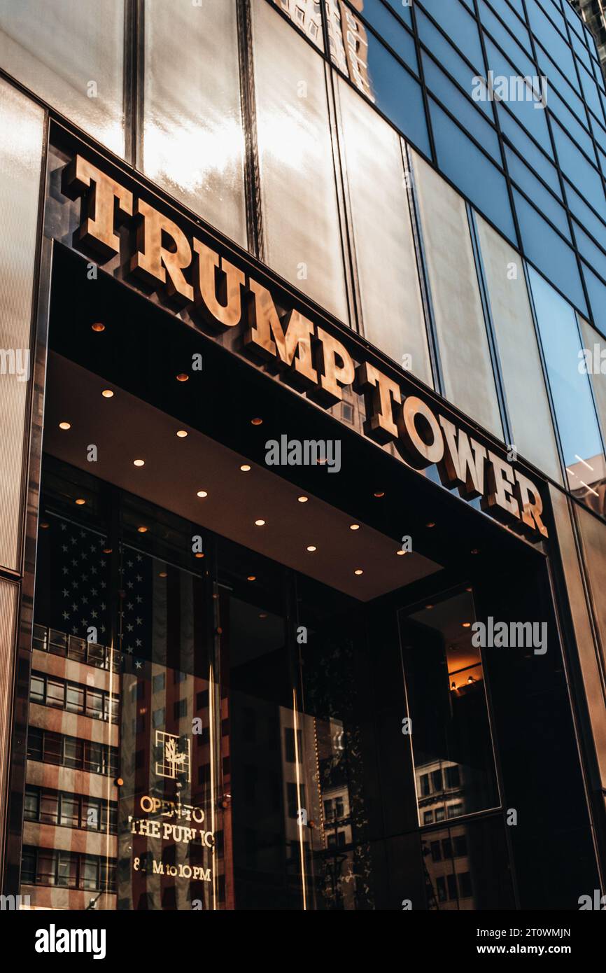 Golden logo sign of TRUMP TOWER on 5th Avenue in Manhattan, NYC USA. Residence of president elect Donald Trump Stock Photo