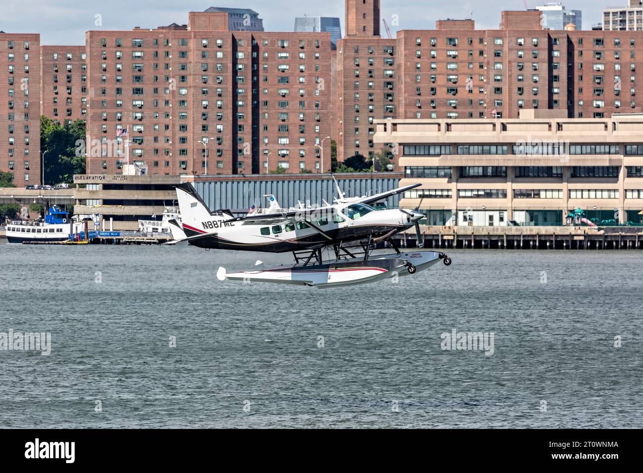 Float planes take off and land in the East River where Brooklyn meets ...
