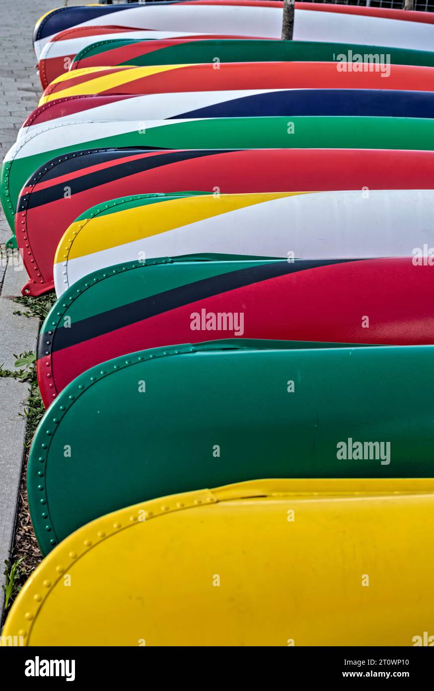 Rental canoes lie in wait at the Gantry Plaza State Park Recreational Dock, at Long Island City’s East River shore. Stock Photo