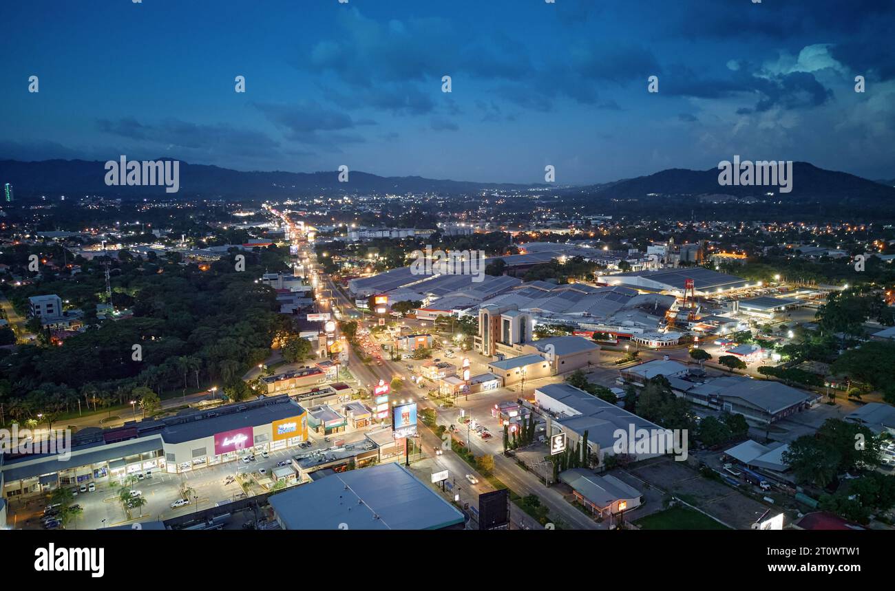 aerial photography in the city of san pedro sula with drone at night over the north exit boulevard Stock Photo