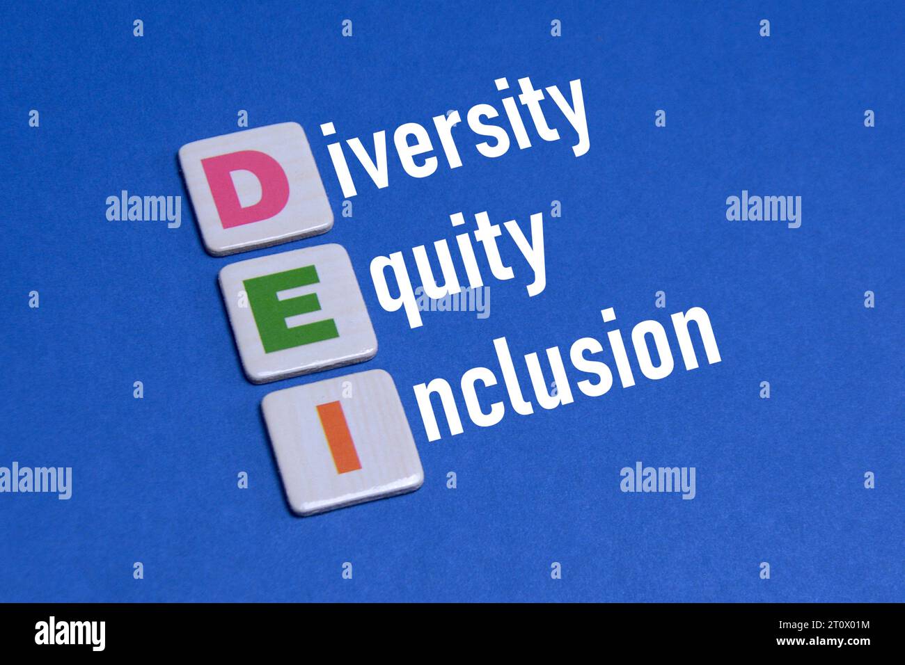 Diversity, Equity and Inclusion (DEI) Words. Colorful DEI Tiles Making Words: Diversity, Equity and Inclusion. Business Concept of DEI. Stock Photo
