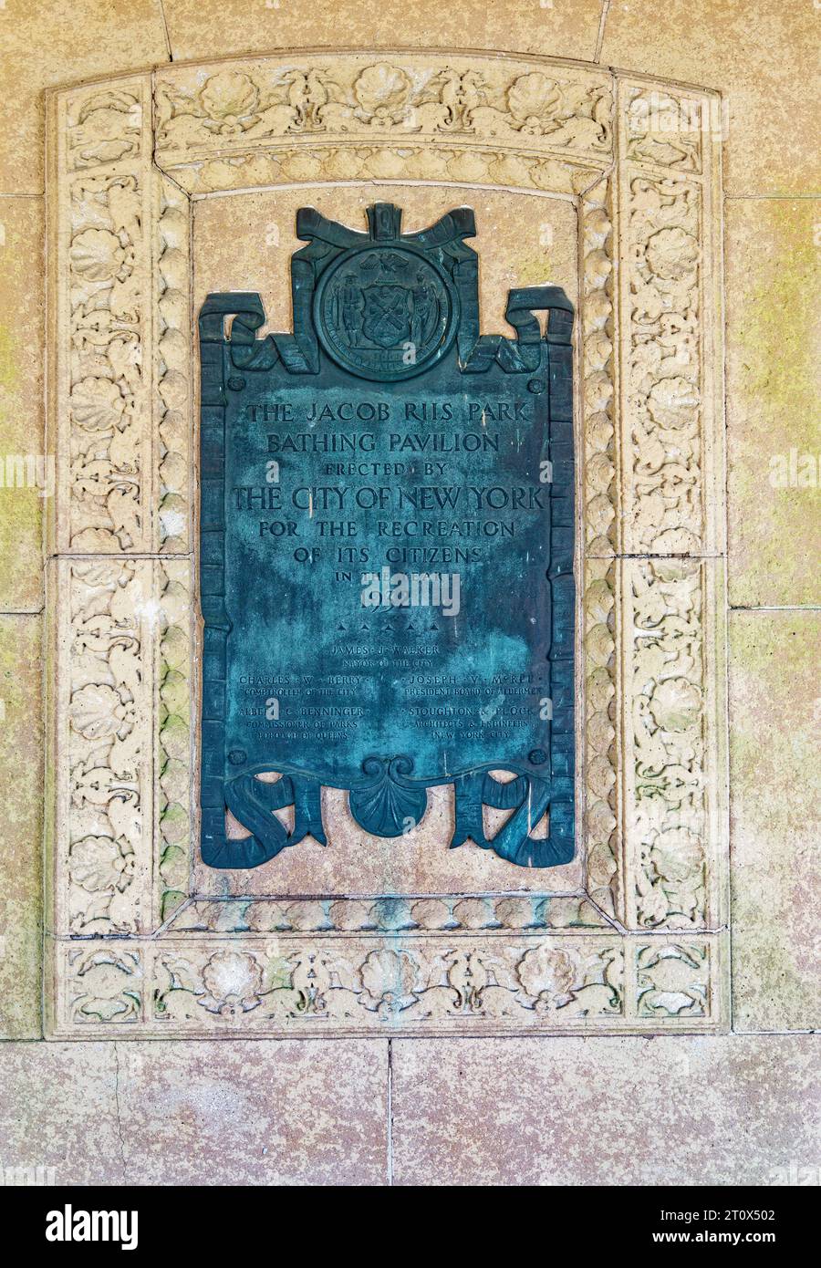 A plaque commemorates The Jacob Riis Park Bathing Pavilion, erected by ...