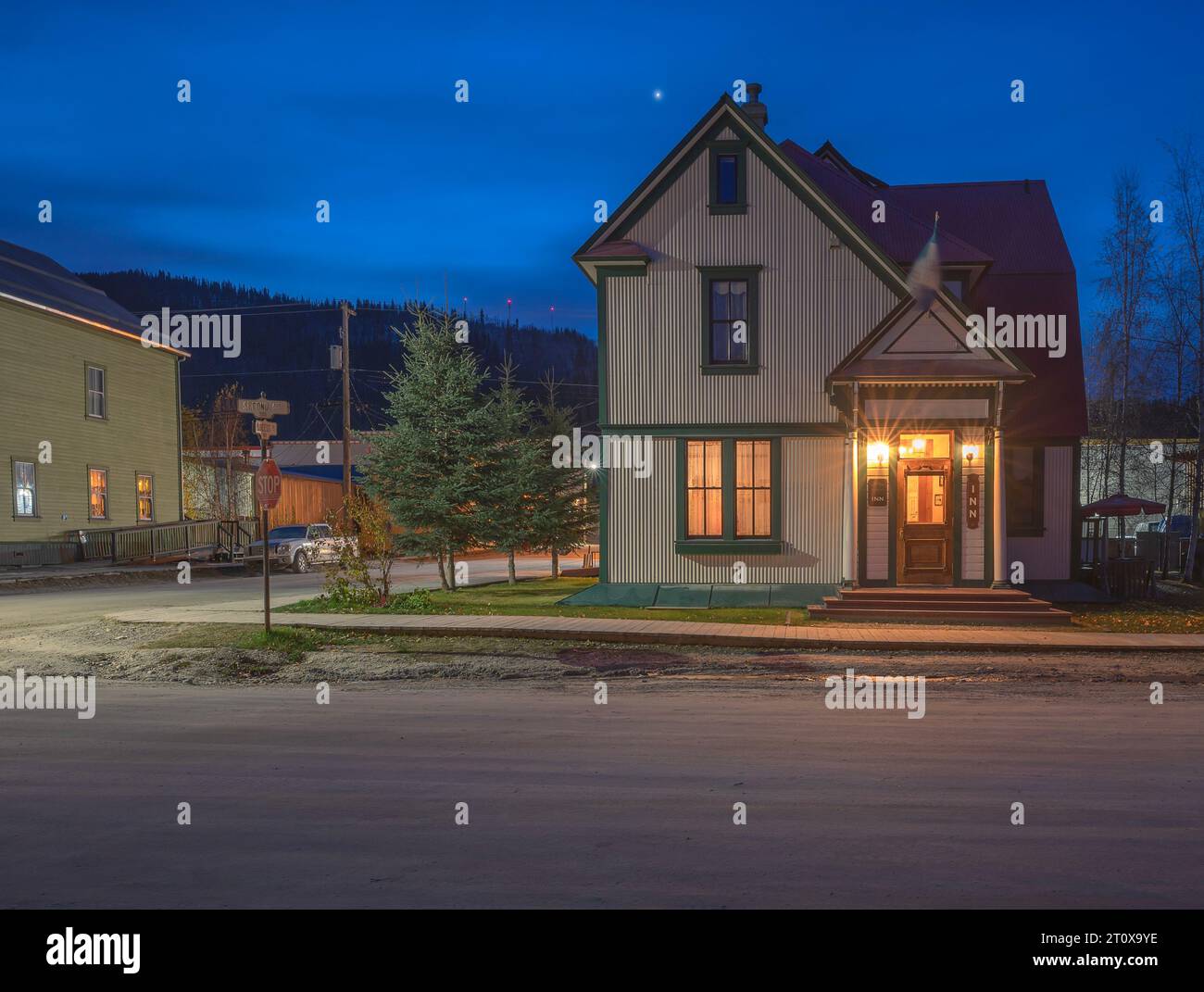 Dawson City, Yukon, Canada – October 05, 2023:  Early morning view of the exterior of historic Bombay Peggy’s Inn Stock Photo