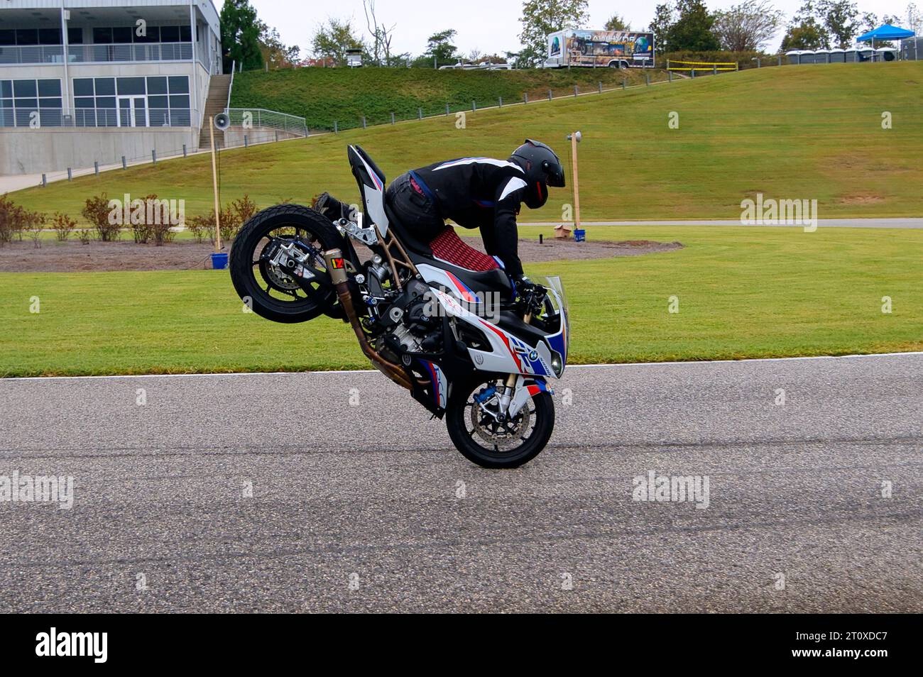 Stunt riding was an attraction at the Vintage Festival at Barber Motorsports in Alabama. Stock Photo