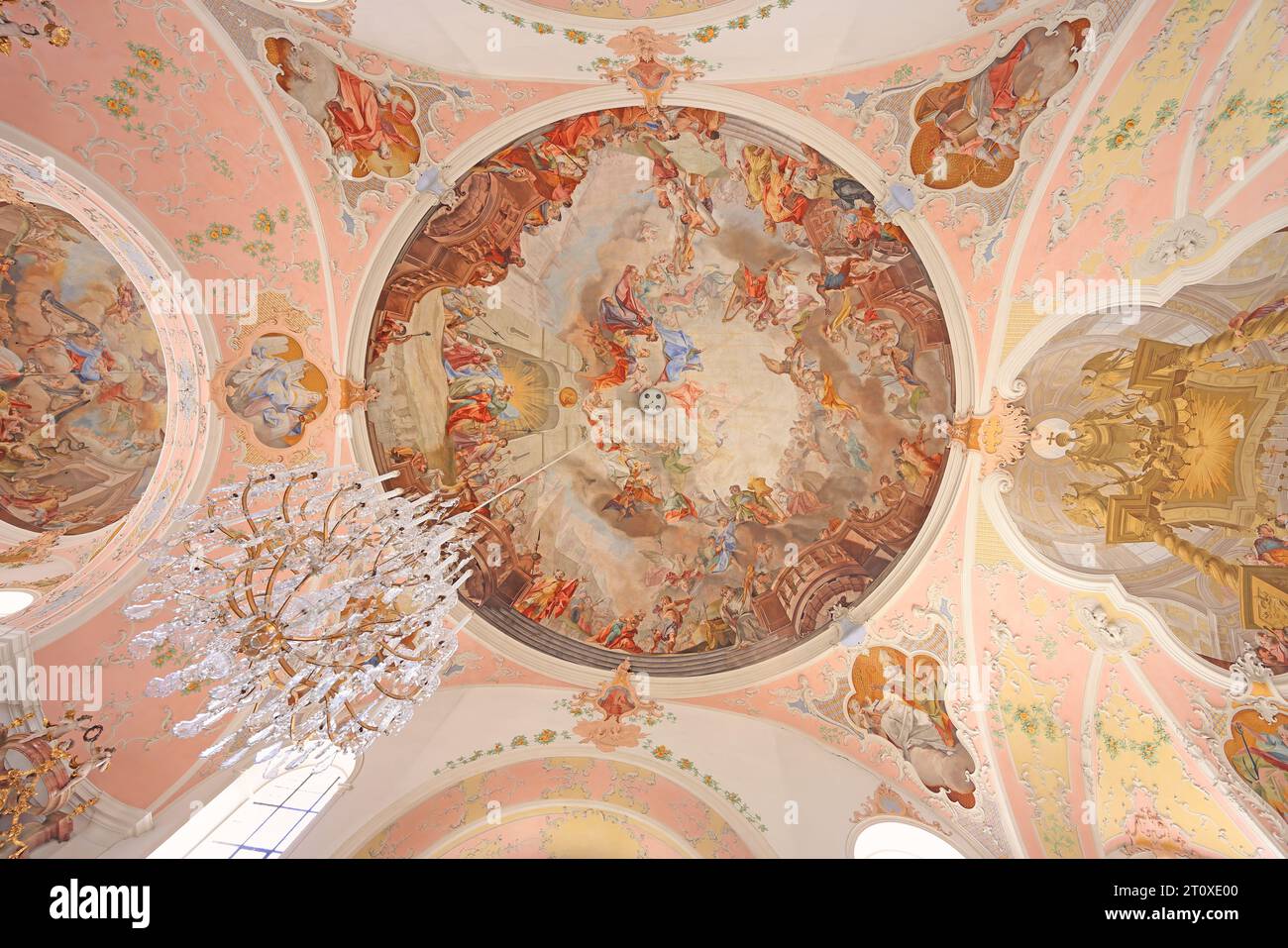 Ceiling and chandelier of St Peter St Paul Church. Joseph Schmuzer led the construction of the church. The ceiling and wall frescoes were made by Matt Stock Photo