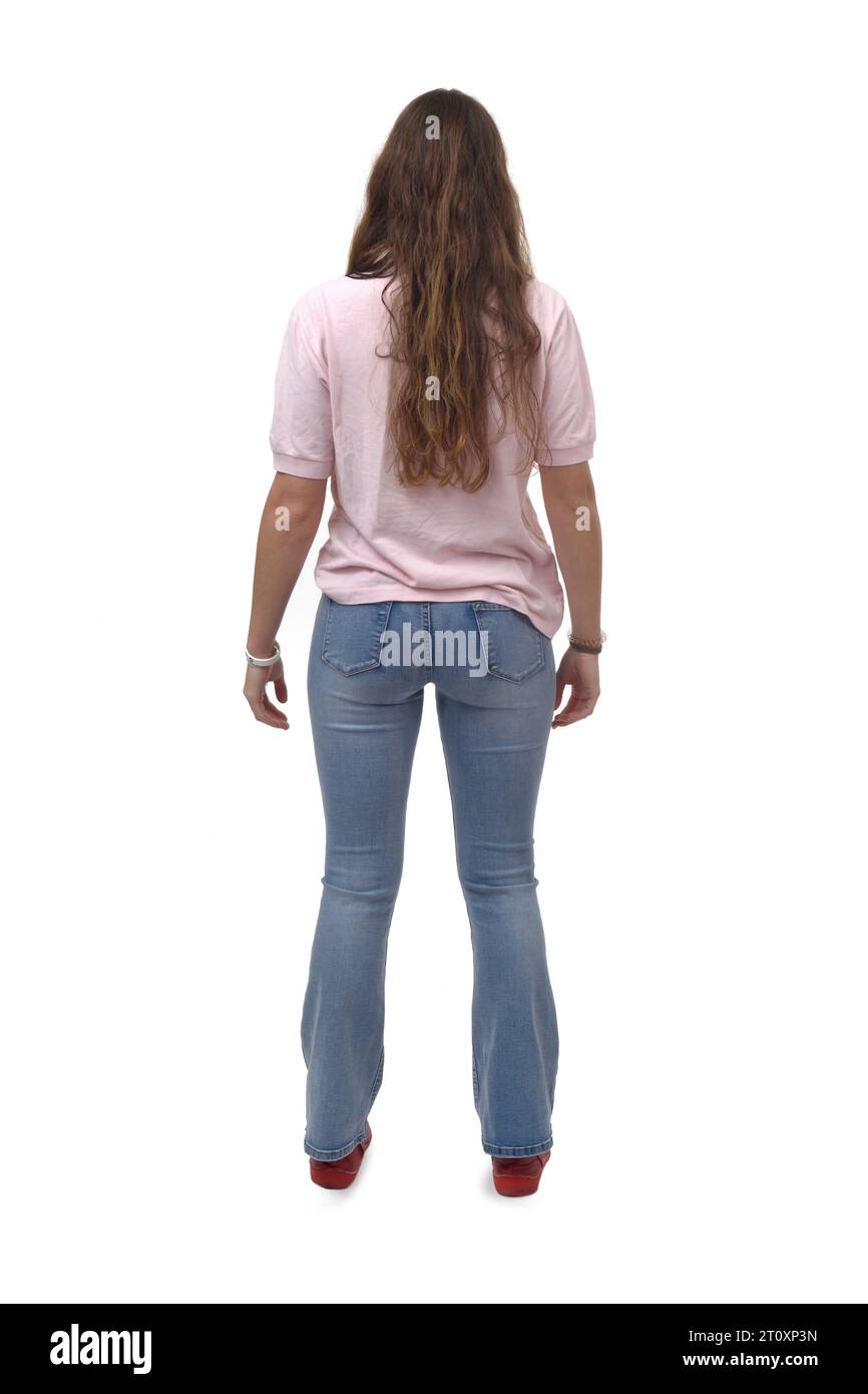 rear view of a young girl standing with on white background Stock Photo ...