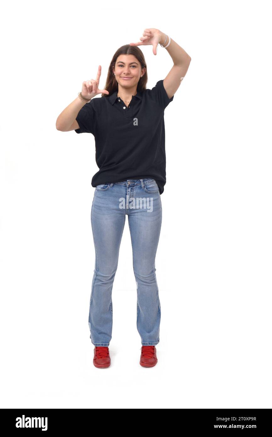 front view of a young girl framing with his hands on white background Stock Photo