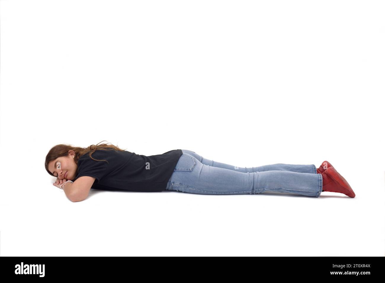 girl lying upside down on white background Stock Photo Alamy