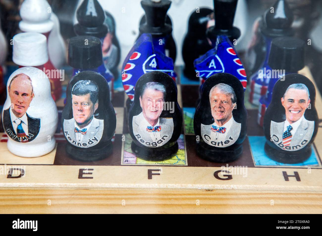 Moscow, Russia. 8th of October, 2023. Chess pawns depicting the president of Russia Vladimir Putin and the presidents of the United States stand on a chessboard on a counter of a souvenir shop in the center of Moscow, Russia Stock Photo