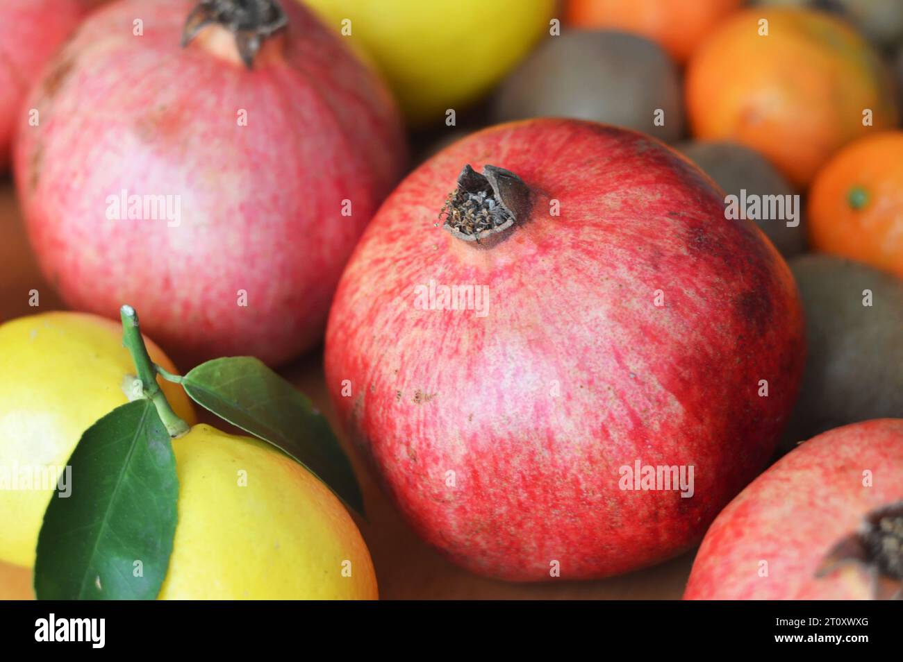 Close up of whole fresh pomegranate Stock Photo