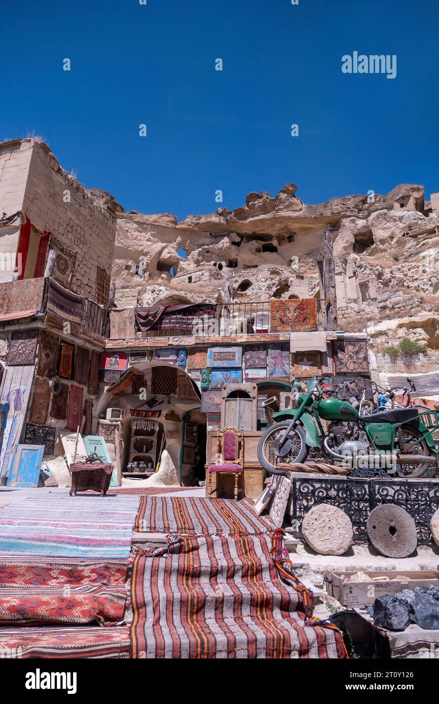 street bazaar of antiques and street carpets in a village in cappadocia, turkey, vertical Stock Photo