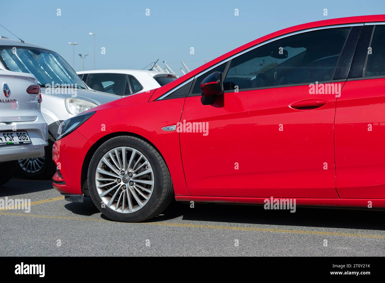 ISTANBUL, TURKEY - SEPTEMBER 9, 2023: 2016 model year Opel Astra (generation K) is on display. Red hatchback Opel Astra is equipped with headlights th Stock Photo