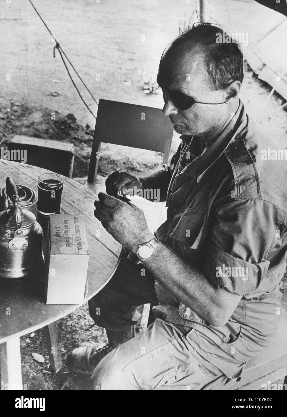 Jun 3, 1967 - Vietnam - General MOSHE DAYAN sits down to a snack while on patrol in Vietnam. Dayan was an Israeli military leader and politician. As commander of the Jerusalem front in Israel's War of Independence, Chief of staff of the Israel Defense Forces (1953-58) during the 1956 Suez Crisis and as Defense Minister during the Six-Day War, he became to the world a fighting symbol of the new state of Israel. After being blamed by some for the army's lack of preparation before the outbreak of the 1973 Yom Kippur War, he left the military and joined politics. (Credit Image: © Keystone Press Ag Stock Photo