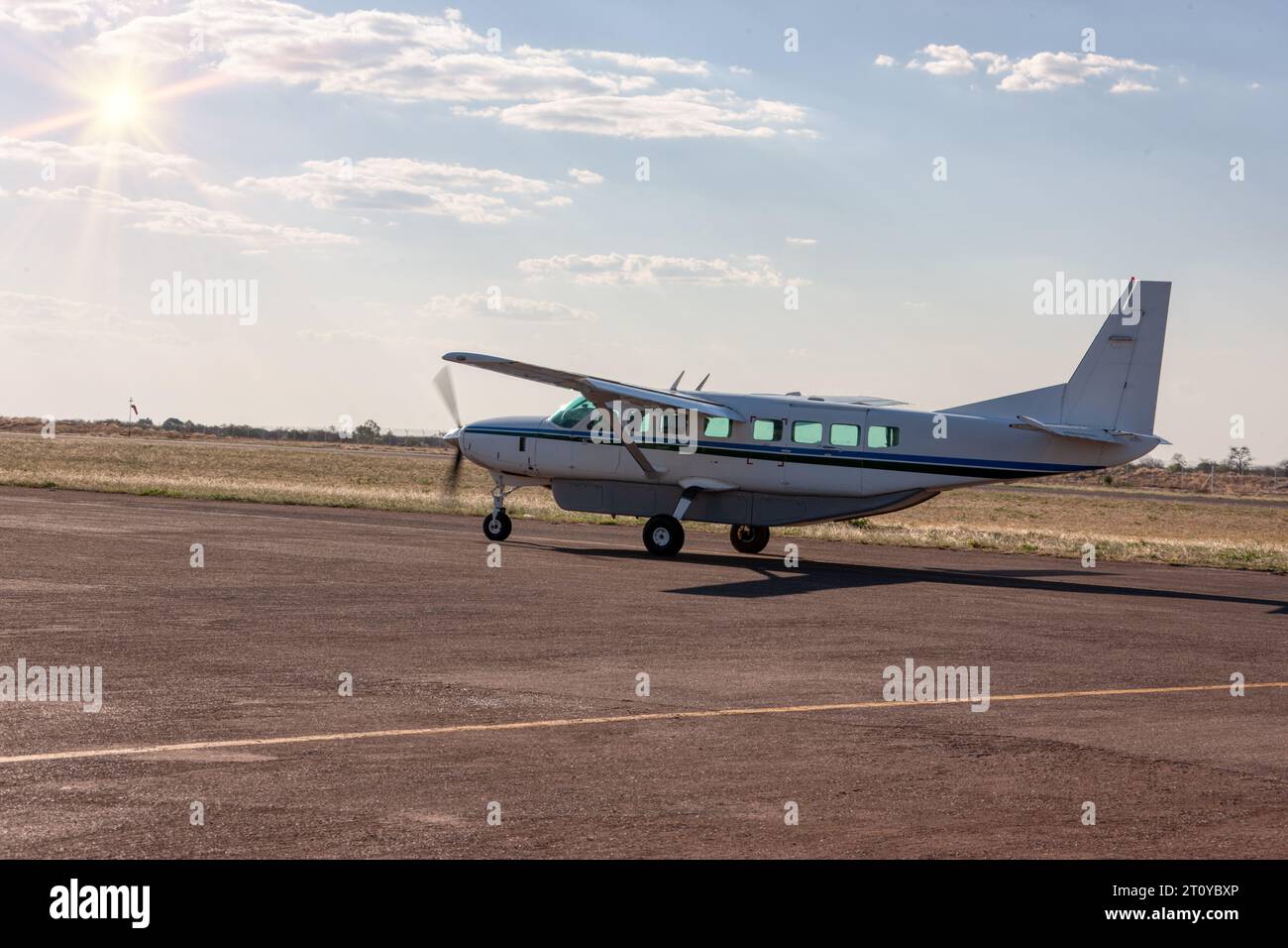 small light aircraft taking off at a small airport in the bush outback Stock Photo
